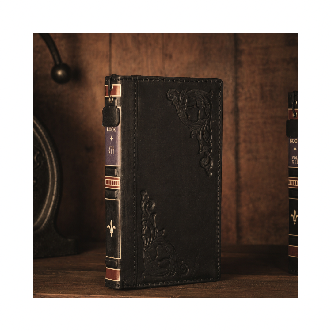 Black leather book style iPhone folio case with decorative vintage spine and hand stitched edges