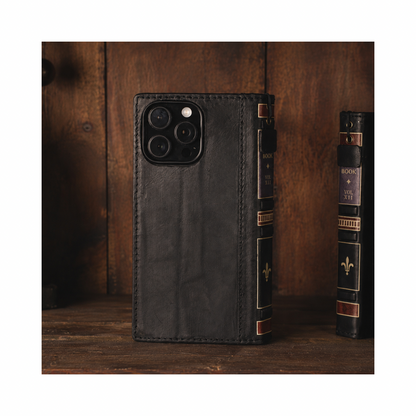 embossed black full grain leather iPhone case with handmade stitching and antique book details