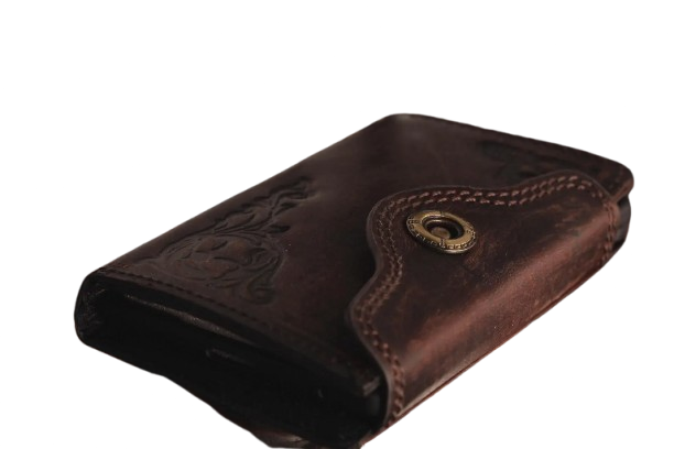 Close-up of hand-tooled floral detailing on full grain leather Z Fold case