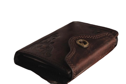 Close-up of hand-tooled floral detailing on full grain leather Z Fold case